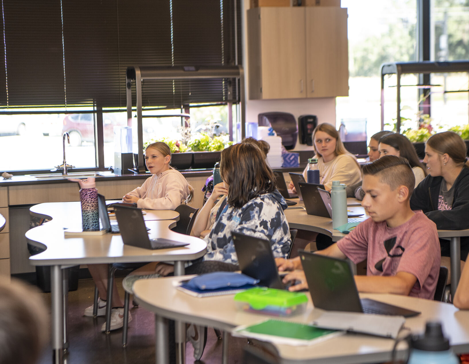 Students grow root vegetables using hydroponics at Ben Steele Middle School